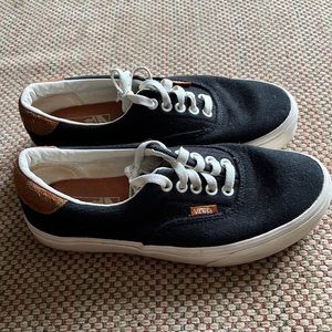 Black Vans with brown suede accent
